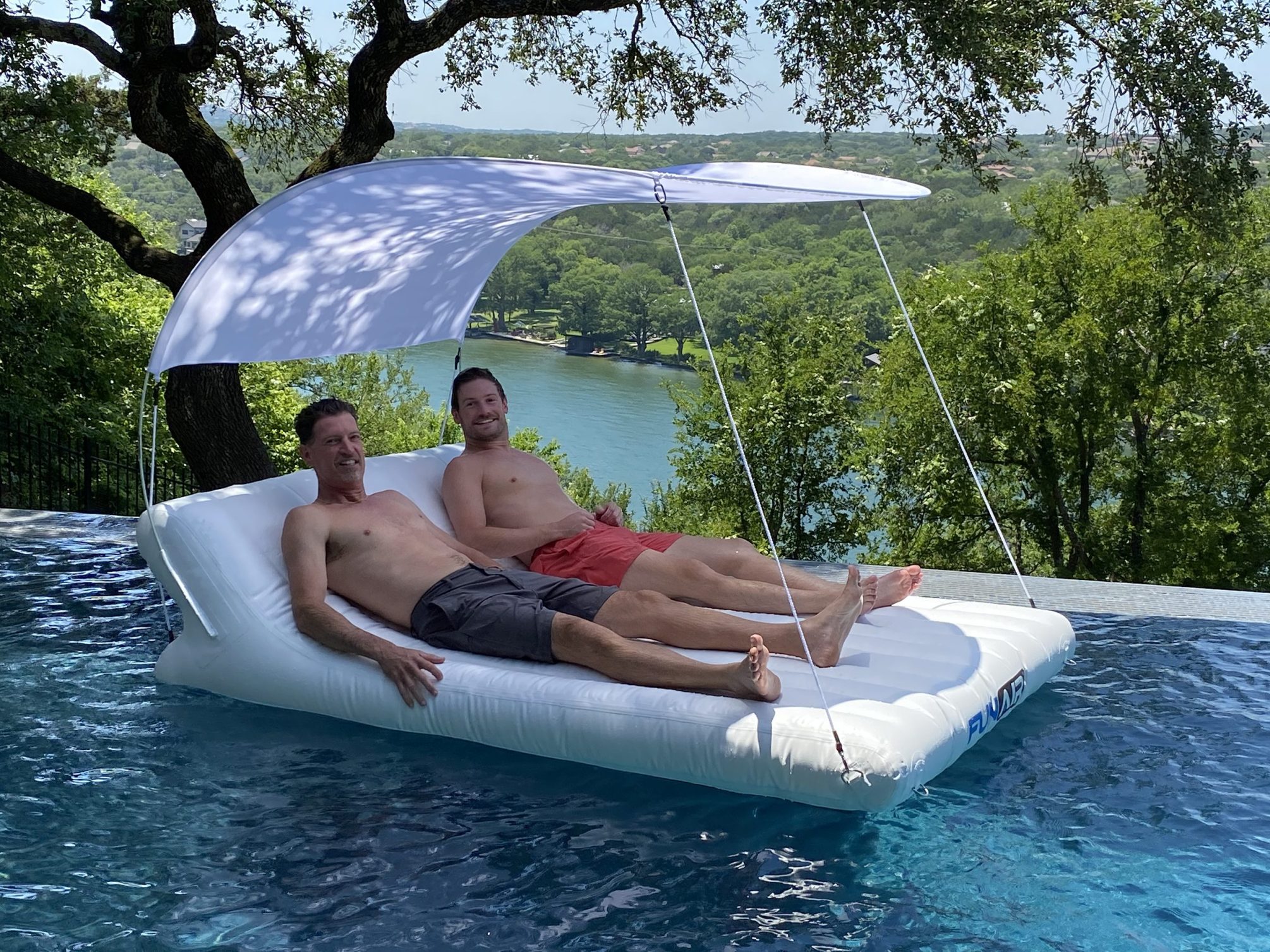 Floating inflatable double shaded lounger