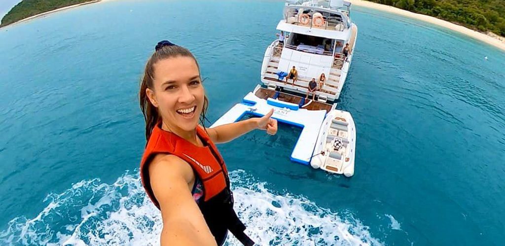 Jessica Lee Hansen on a flyboard above superyacht Alani