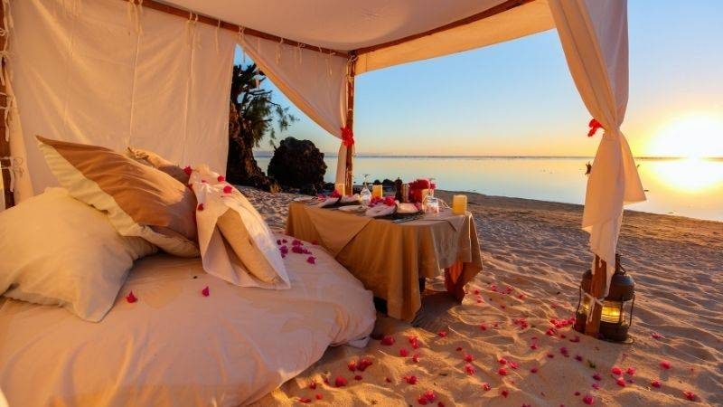 Romantic valentines day picnic setup on the beach
