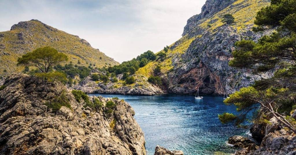 A Superyacht tender visiting the Private Beach and Coves at Sa Calobra Mallorca Spain