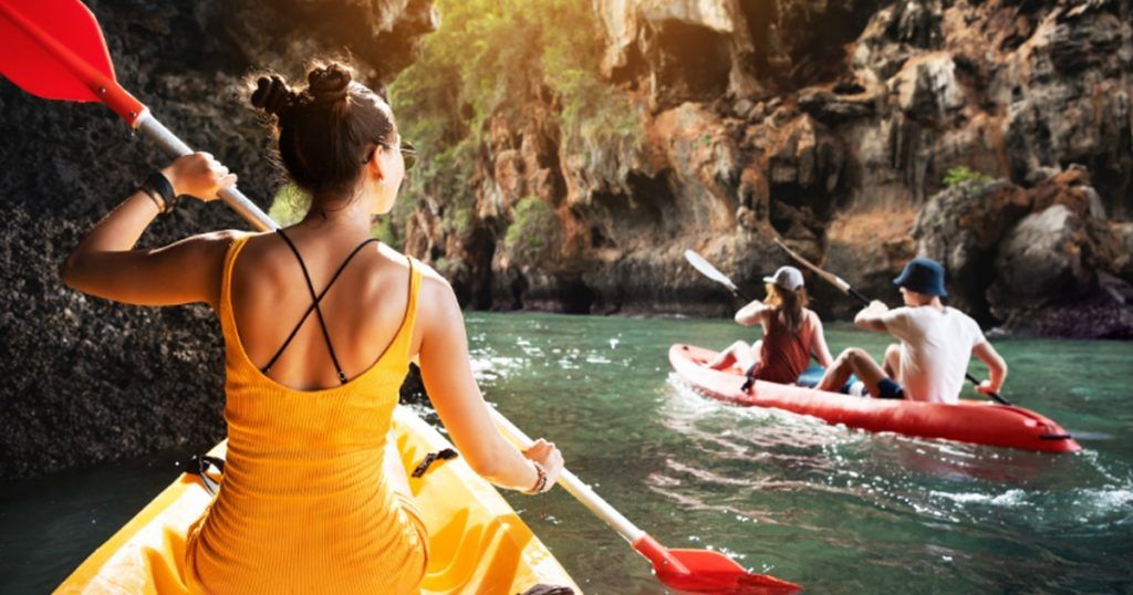 Yacht Crew relaxing on a canoe trip