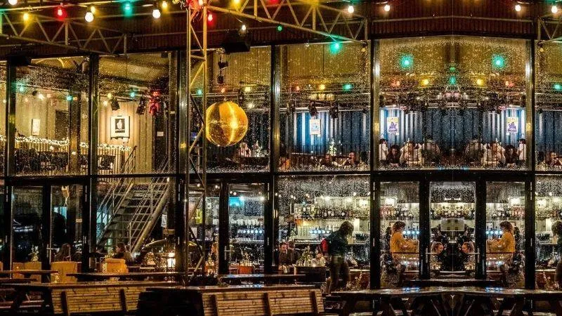 Evening cocktail bar with party lights