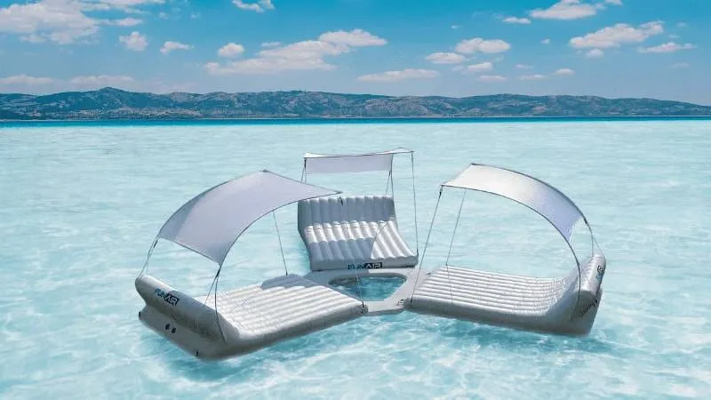 Floating Splash Island in clear water by the beach