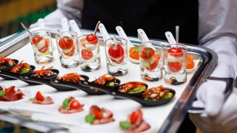 Service tray with tomatoes and snacks
