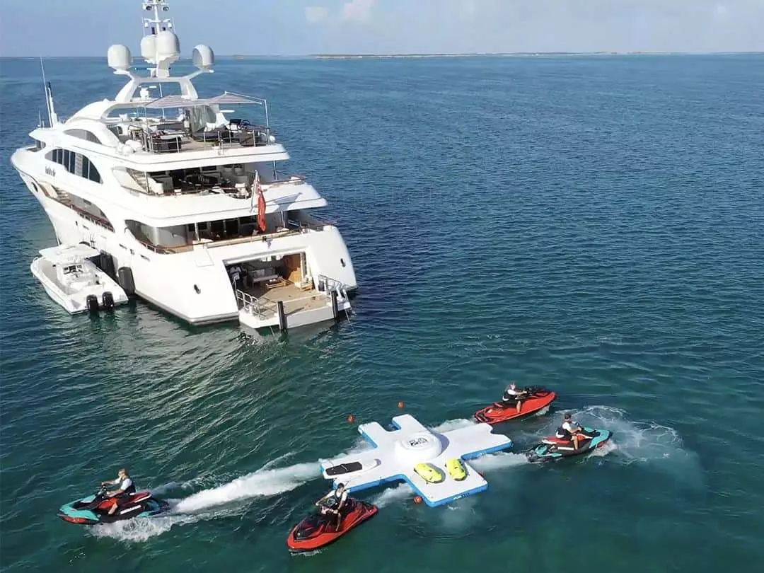 Jet Skis leaving the FunAir Toy Island behind Motor Yacht Latitude